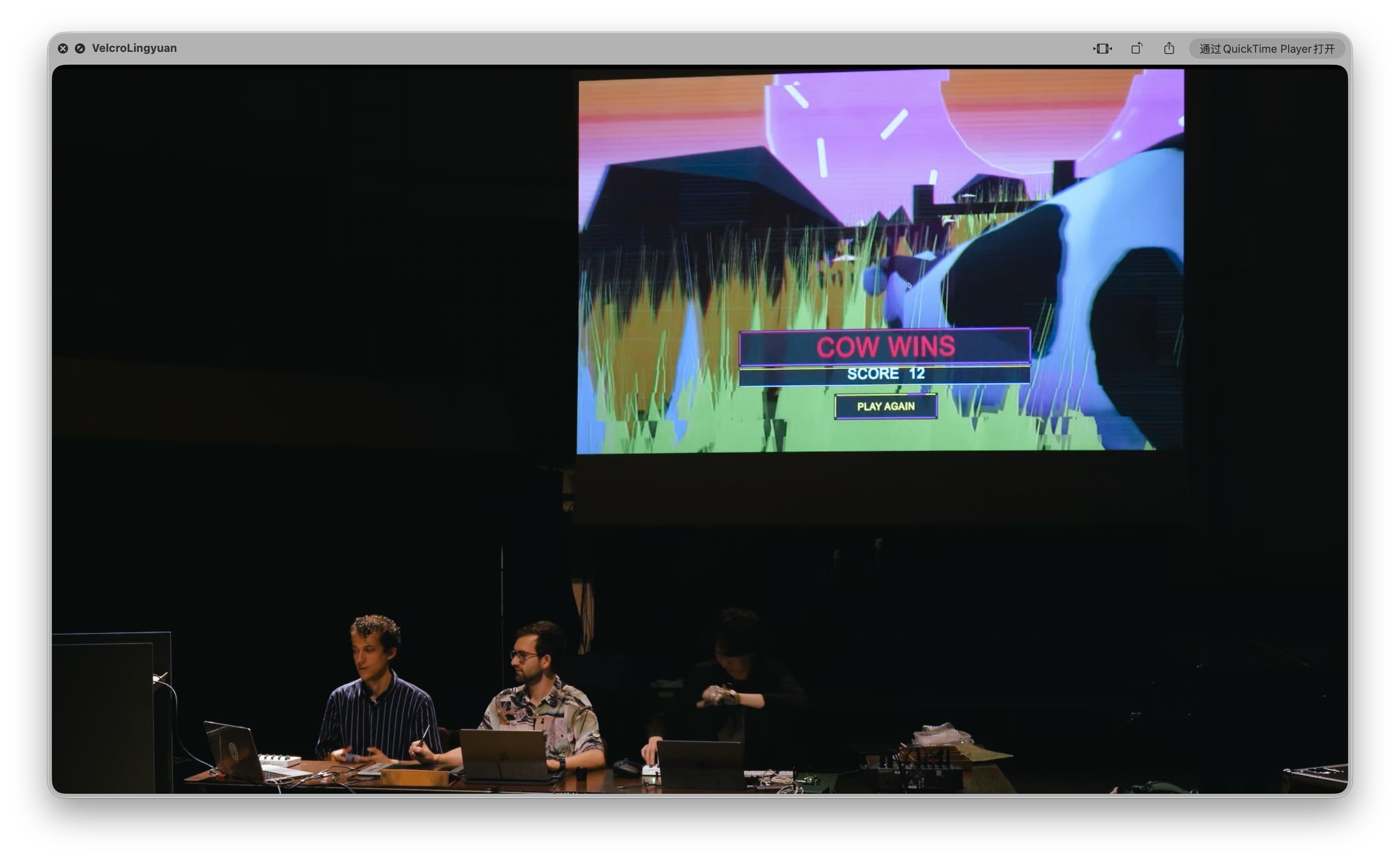 Electronic improvisation ensemble performing beneath a projection showing COW WINS